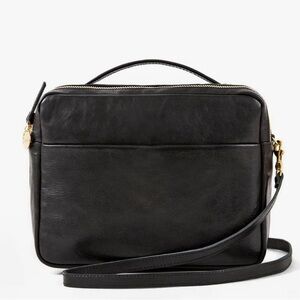 Clare V. Mirabel in black